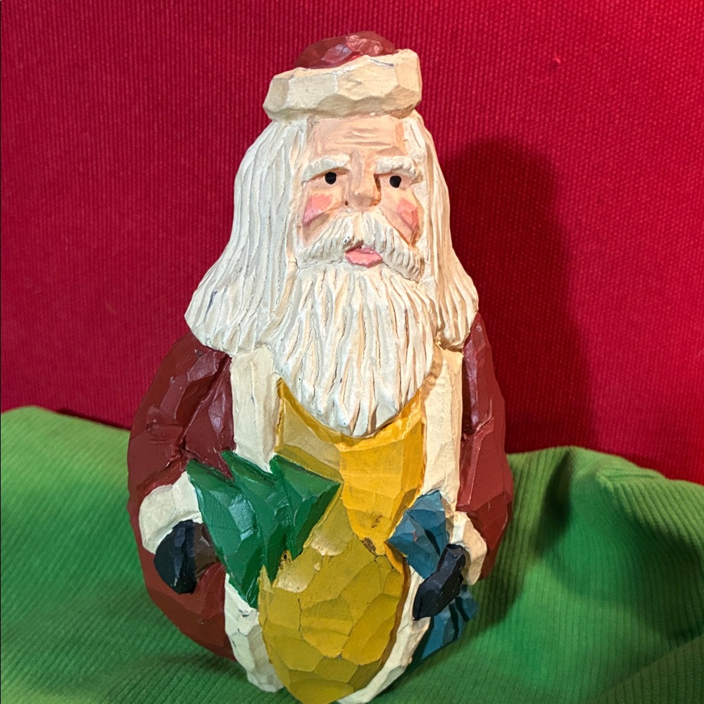 Handcrafted Folk Art Santa Figurine with Green and Yellow Accents signed JY